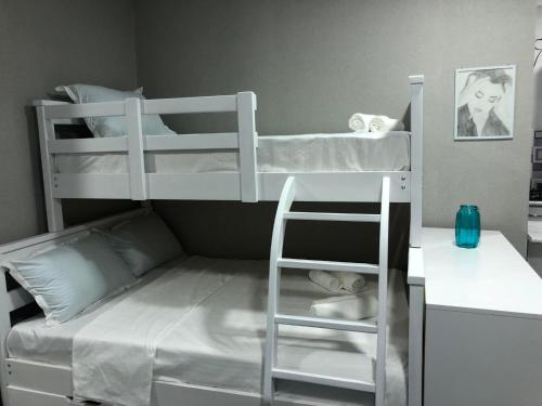 Двухъярусная кровать или двухъярусные кровати в номере LukasSaloMea