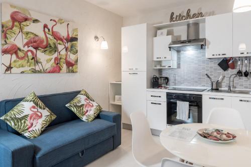 Dapur atau dapur kecil di Resilienza Tropical Apartments & Room