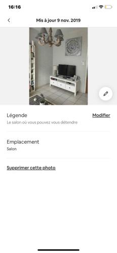 Captura de pantalla de una página web de una sala de estar en Dans la bonne humeur, en Hénin-Beaumont