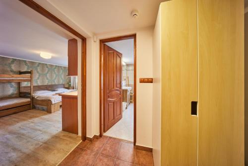 Postel nebo postele na pokoji v ubytování Apartment Eskadra