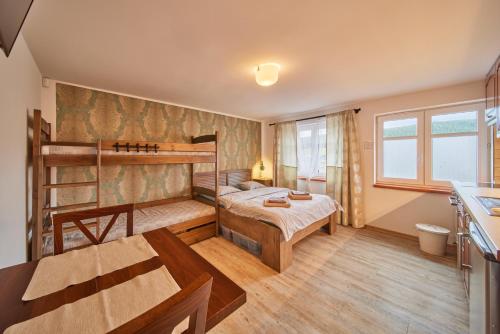Postel nebo postele na pokoji v ubytování Apartment Eskadra