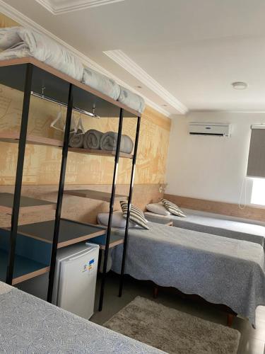 Postel nebo postele na pokoji v ubytování SuiteCase