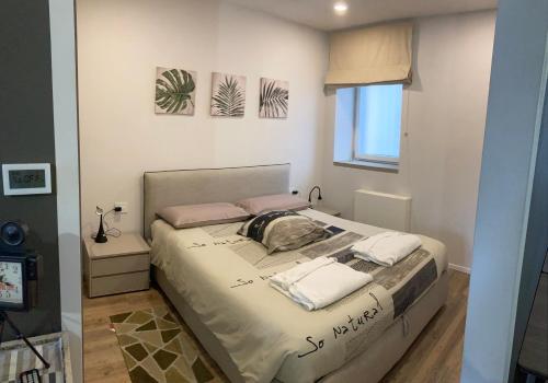 En eller flere senge i et værelse på appartamenti Il Borgo orchidea