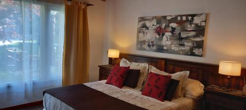 Postel nebo postele na pokoji v ubytování Complejo DEPARTAMENTOS ANDINOS