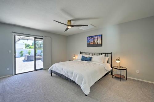 a bedroom with a bed and a ceiling fan at 3 Mi to Kierland! Luxe Desert Home with Heated Pool in Scottsdale