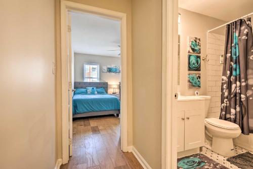 a bathroom with a bed and a toilet in a room at Baltimore Townhome Near Oriole Park with AandC! in Baltimore