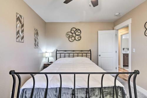 a bedroom with a bed in a room at Cozy Retreat with Yard Space about 11 Mi to Longmont! in Platteville