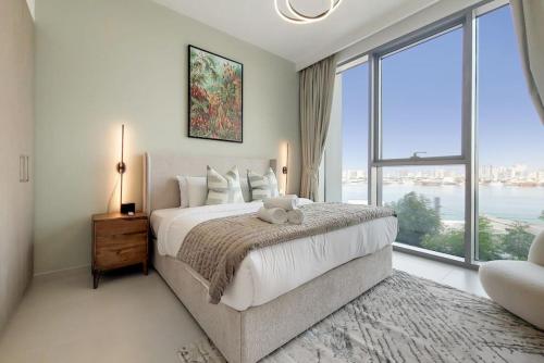 Postel nebo postele na pokoji v ubytování The Grand, Dubai Creek Harbour - Vacationer