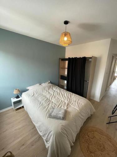 Posteľ alebo postele v izbe v ubytovaní Bourg en Bresse: Superbe appartement de 100 m2