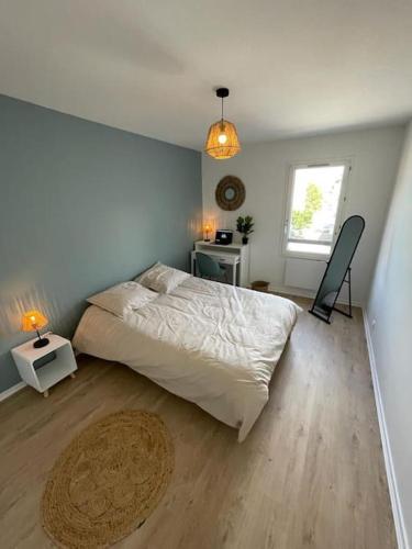 Postel nebo postele na pokoji v ubytování Bourg en Bresse: Superbe appartement de 100 m2