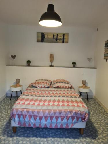 Postel nebo postele na pokoji v ubytování Studio en plein cœur de l'île de loisirs de Buthiers
