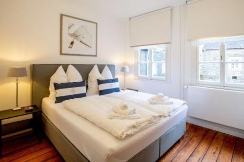 Voodi või voodid majutusasutuse ROMANTIK-RESIDENZ MONSCHAU Apartments toas