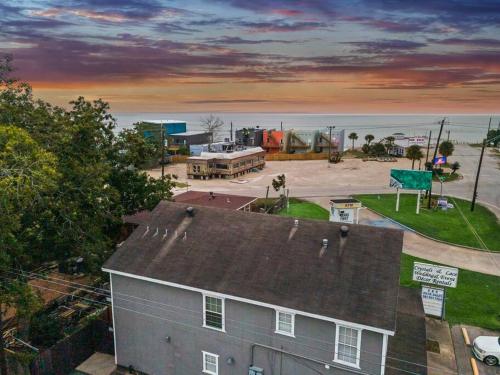 an aerial view of a house with the beach at Sunnyside Retreat in Bacliff