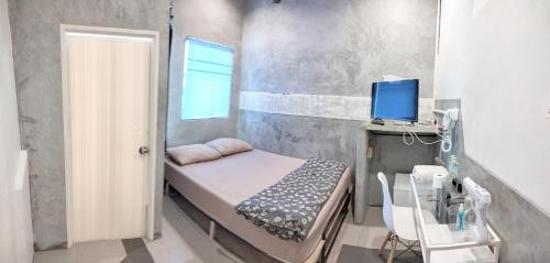 Ένα ή περισσότερα κρεβάτια σε δωμάτιο στο Hive28