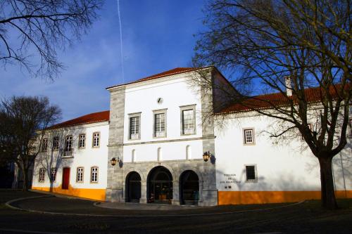 a large white building with a red roof at Pousada Convento de Beja in Beja