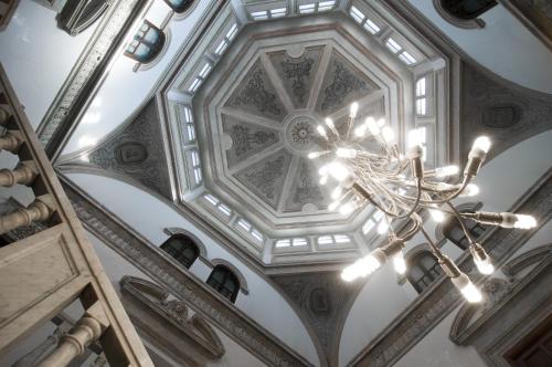 a chandelier hanging from the ceiling of a building at Hospes Palacio de los Patos, a Member of Design Hotels in Granada
