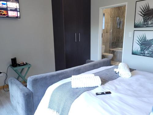 Postel nebo postele na pokoji v ubytování Ayana bnb