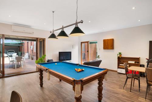 a living room with a pool table at City Edge Home From Home in Keswick