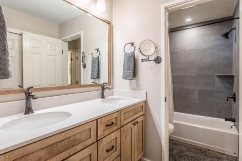 a bathroom with a sink and a shower at Aspen Creek 121 in Mammoth Lakes