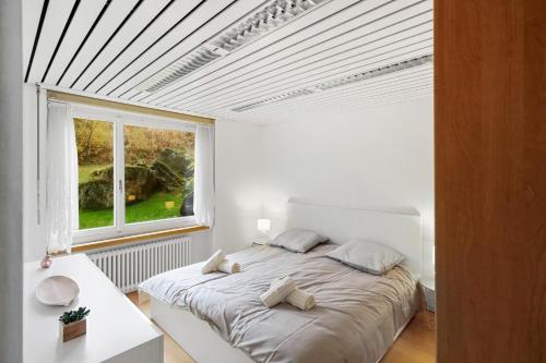 Postel nebo postele na pokoji v ubytování Appartement confortable avec un sauna