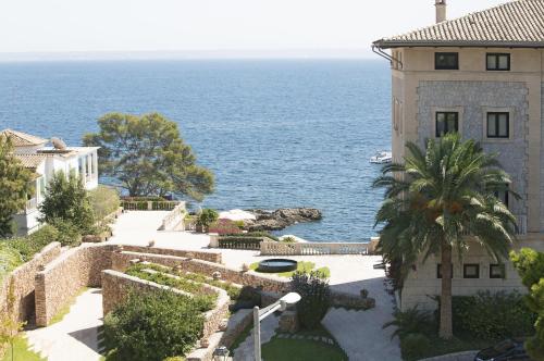 a house with a view of the ocean at Hospes Maricel y Spa, Palma de Mallorca, a Member of Design Hotels in Cas Catala