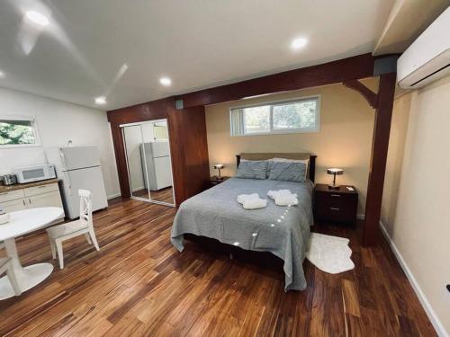 En eller flere senger på et rom på Mountain Lodge Estate
