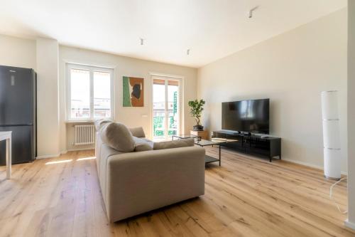 A television and/or entertainment centre at La Dolce Vita - Sunny Penthouse Trastevere Station 100sqm
