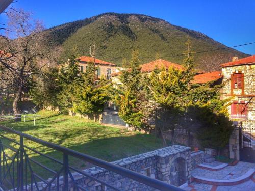 a town with a mountain in the background at "Orchomenos" Apartment of Levidi Arcadian Apartments in Levidhion