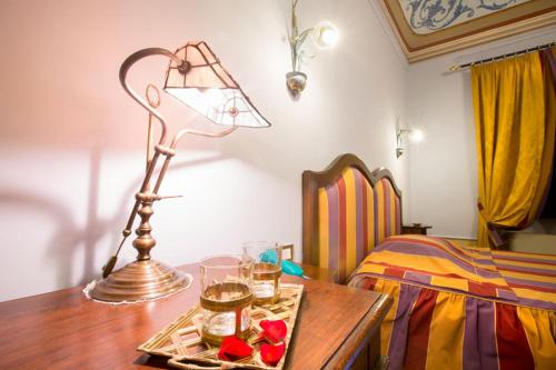 Postel nebo postele na pokoji v ubytování Hotel Corte dei Tini