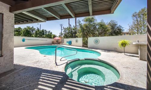 a swimming pool in the backyard of a house at Peaceful Private Retreat In The Heart Of Town in Redlands