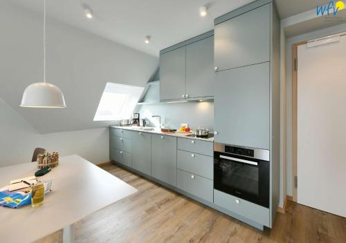 Kuchyň nebo kuchyňský kout v ubytování Toewerhus - Wohnung Watt