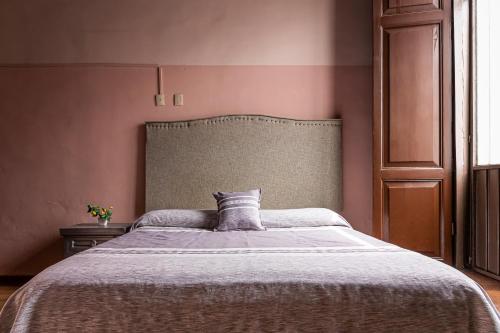 Postel nebo postele na pokoji v ubytování Hotel Cantera Rosa