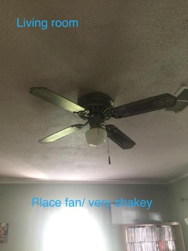 a ceiling fan sitting on top of a room at Yorkshire Estates in Manassas