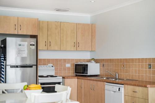 Kuchyň nebo kuchyňský kout v ubytování Apartment 8T