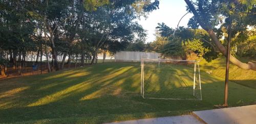 Zahrada ubytování AP do LAGO, com Churrasqueira privativa , cozinha , internet no ap, rampa barco e jet, pesqueiro - B101