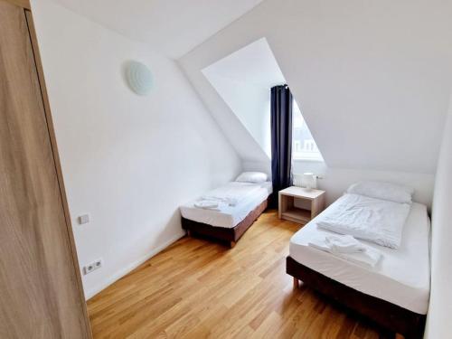 Postel nebo postele na pokoji v ubytování Nice apartament in the heart of Berlin 51
