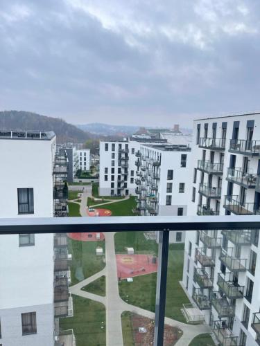 a view from the balcony of a apartment building at Central apartment in Vilnius