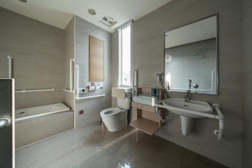 Koupelna v ubytování Taipung Suites
