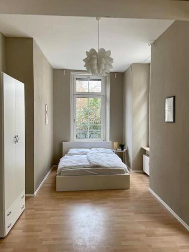 Un pat sau paturi într-o cameră la Altstadtflair