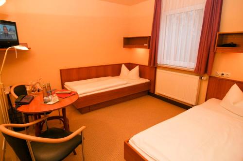 Postel nebo postele na pokoji v ubytování Hotel Balneolum Superior