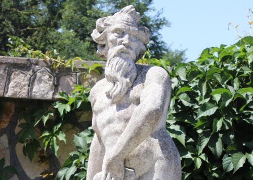 a statue of a man standing in a garden at Villa Walter in Sorrento
