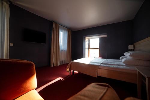 Sribni Leleky Hotel & Spaにあるベッド