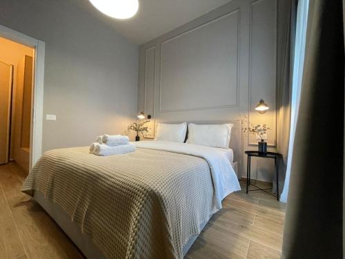 Katil atau katil-katil dalam bilik di Square 21 Apartments