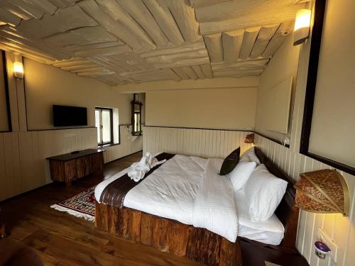 Cama o camas de una habitación en The Nettle and Fern Farmstay