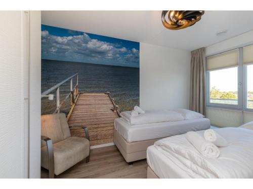 Postel nebo postele na pokoji v ubytování Apartment on Tholen by Oosterschelde Estuary