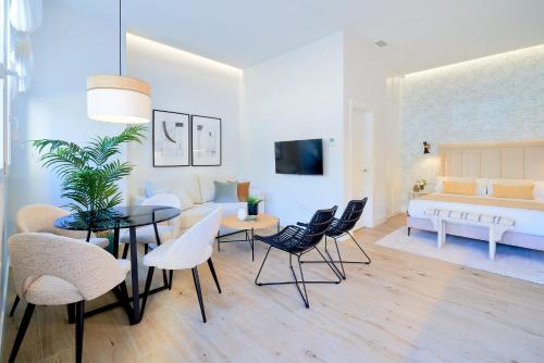 Posteľ alebo postele v izbe v ubytovaní Lofts Parque de Huelin