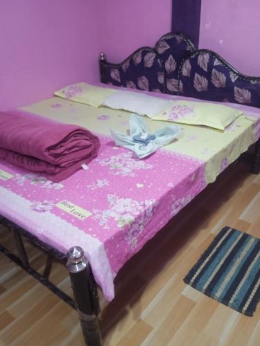 Un ou plusieurs lits dans un hébergement de l'établissement Shalom guest house