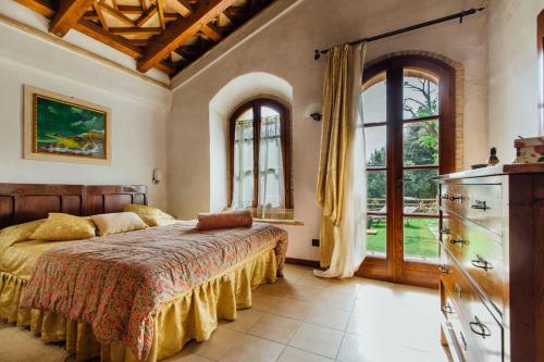 Postel nebo postele na pokoji v ubytování Casa Conti di Sotto