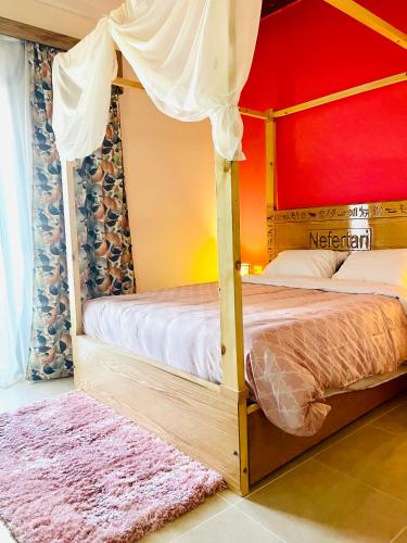 Postel nebo postele na pokoji v ubytování Jewel Howard Carter Hotel
