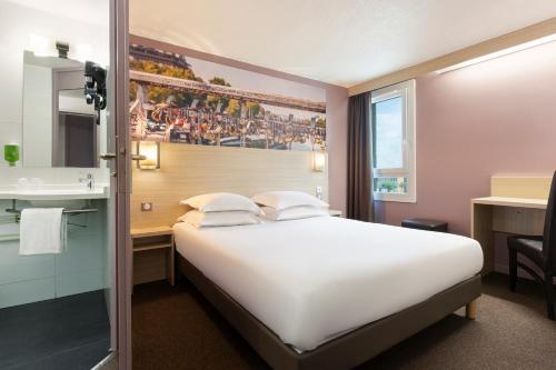 Katil atau katil-katil dalam bilik di B&B HOTEL Marne-la-Vallée Chelles